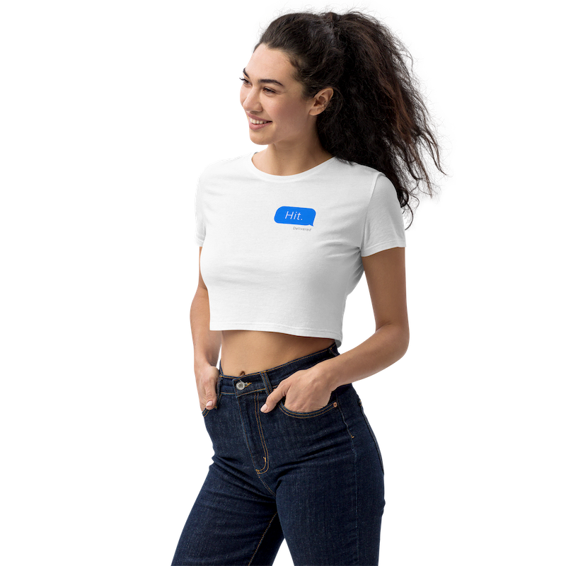 "Hit." Crop Tee in White on a Model